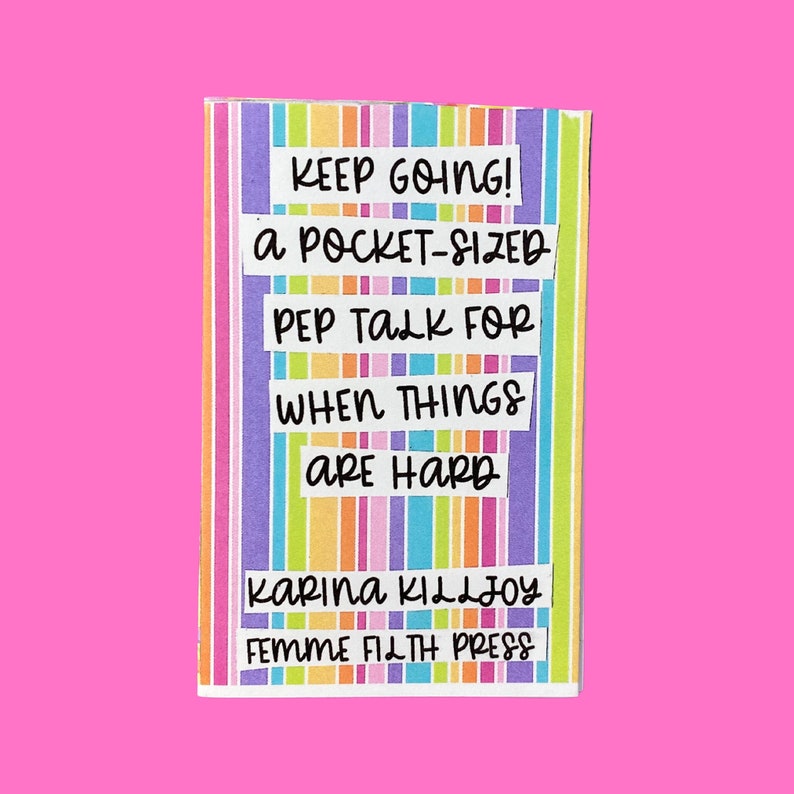 Peut inclure: Une carte ray&eacute;e color&eacute;e avec le texte "KEEP GOING! A POCKET-SIZED PEP TALK FOR WHEN THINGS ARE HARD" et le texte "KARINA KILLJOY FEMME FILTH PRESS" en bas.