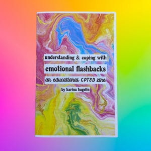 May include: A zine with a marbled cover featuring swirls of pink, blue, yellow, and gold. The text reads: understanding & coping with emotional flashbacks, an educational CPTSD zine, by karina hagelin, printed on white rectangular labels.