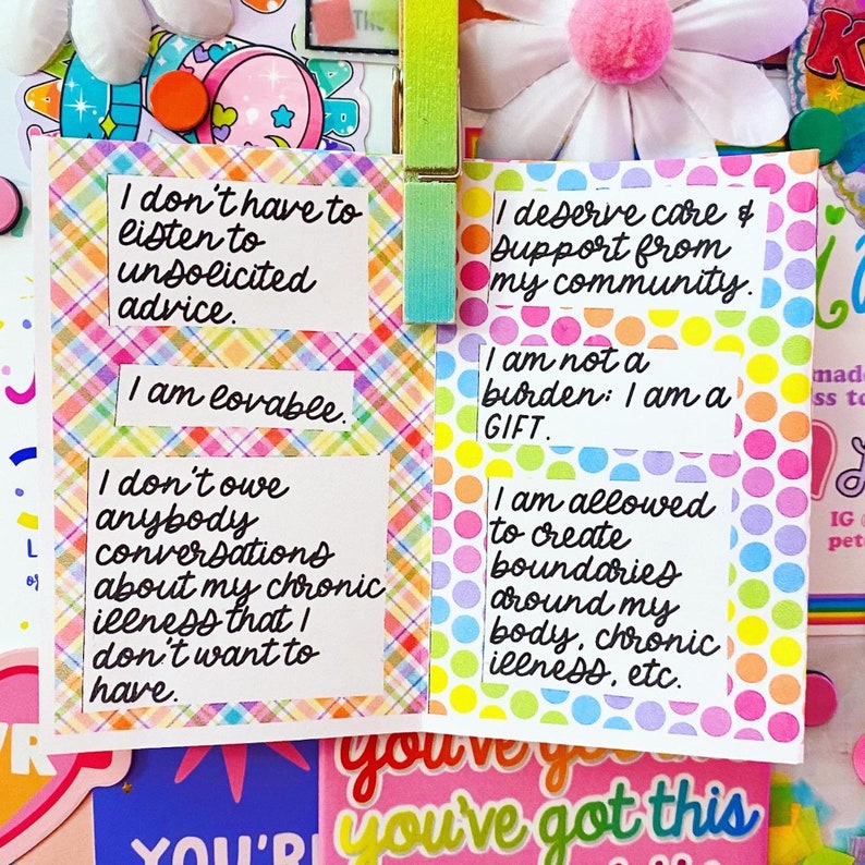 May include: Four colorful affirmation cards with positive messages about self-care and boundaries. The cards have a checkered pattern, polka dots, and a rainbow pattern. The text on the cards reads: "I don't have to listen to unsolicited advice. I am lovable. I don't owe anybody conversations about my chronic illness that I don't want to have." and "I deserve care & support from my community. I am not a burden: I am a GIFT. I am allowed to create boundaries around my body, chronic illness, etc."
