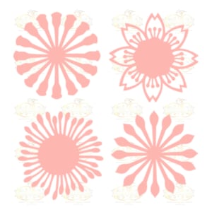 Puede incluir: Cuatro recortes de flores de papel rosa. Dos de las flores tienen una forma circular con un círculo central y pétalos radiantes. Las otras dos flores tienen una forma de flor más tradicional con cinco pétalos.