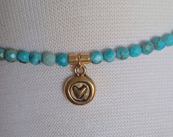 Turquoise and rice pearls and gold spacers with Gold Vermiel heart pendant, 16-17" necklace with a gold filled clasp and 2" extension