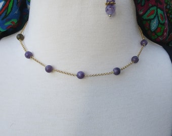 Purple Lepidolite and Purple Amethyst 6mm beads on a gold filled 17 inch chain. Earrings included with necklace!