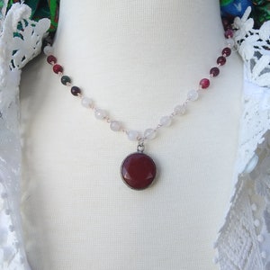 Elegant Necklace of Rubies and Moonstone with pink wire and centered by a lovely Pendant of Dark Pink Jade