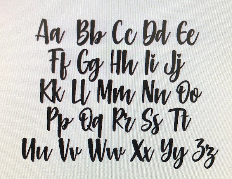 May include: Black cursive alphabet letters A to Z, displayed on a white background. The letters are in uppercase and lowercase, with a handwritten style. The image is a close-up of the alphabet.