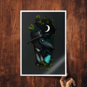 May include: A black and white illustration of a plague doctor wearing a long beak mask and a hat. The doctor is standing in a coffin-shaped frame with a crescent moon and a dark blue river in the background. The frame is surrounded by green ivy.