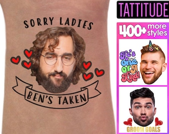 May include: A temporary tattoo featuring a photographic portrait of a bearded person with glasses, surrounded by red hearts and the text SORRY LADIES BEN'S TAKEN. The image includes additional promotional text and examples of other tattoo styles.