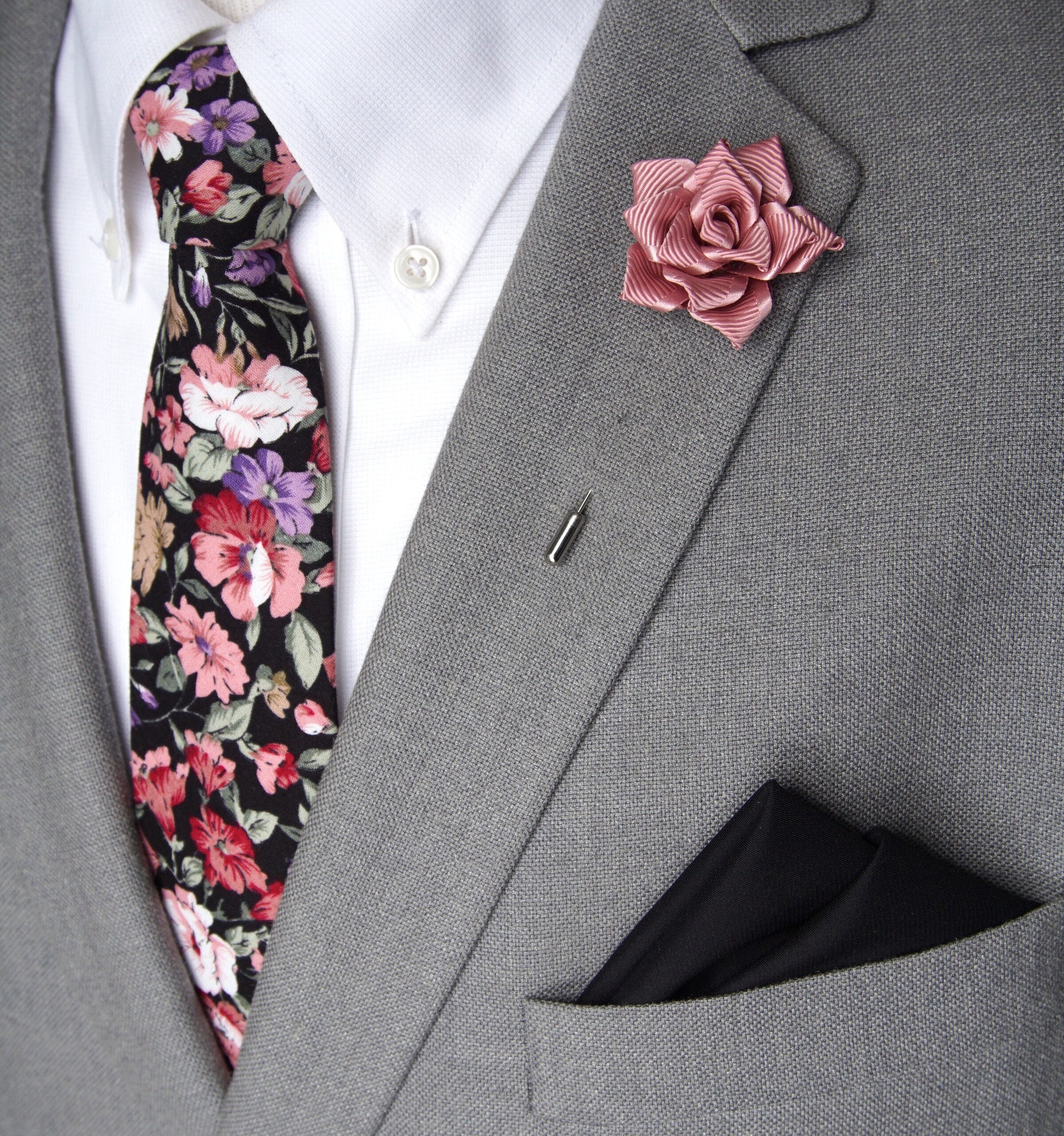 grey suit with floral tie