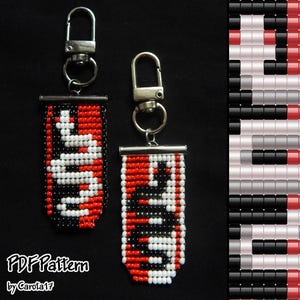 May include: Two beaded keychains with silver-tone fixings. The keychains display a red, black, and white pattern. One keychain has a white design on a red background. The other has a red design on a black background. A pattern is shown on the right.