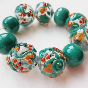 hollow glass beads, blown glass, transparent