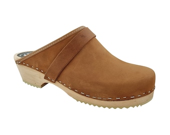 May include: Brown leather clog with a wooden sole and a strap across the top.