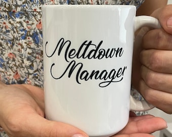 Meltdown Manager Tasse