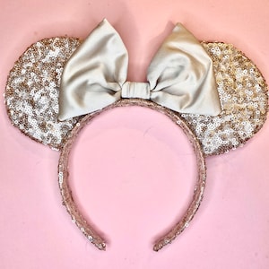 Glitzernde Mäuseohren in gold