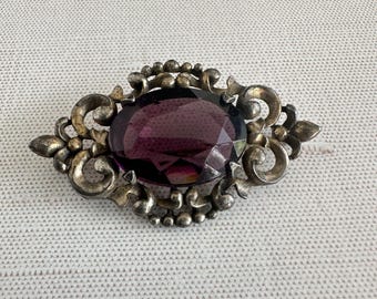 Victorian Edwardian Amethyst Glass Oval Brooch Scrollwork Frame