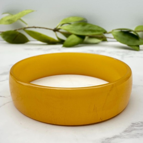 Vintage Egg Yolk Bakelite Bangle Bracelet: Collectible Plastic Jewelry