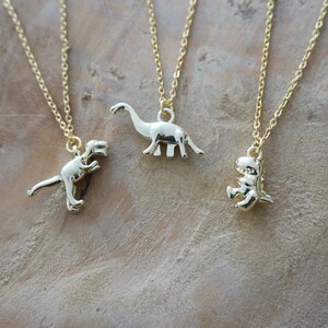 diplodocus dinosaur necklace - T-Rex Tyrannosaurus tyrannosaur archaeologist historian - trendy gold necklace - gold jewelry