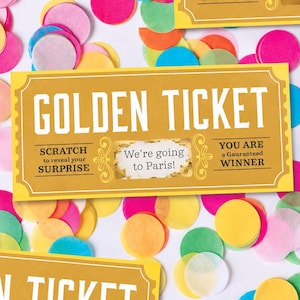 Może przedstawiać: Prostokątny bilet w kolorze złotym z białym napisem GOLDEN TICKET, SCRATCH to reveal your SURPRISE oraz YOU ARE a Gauranteed WINNER. Centralne pole do zdrapania ujawnia tekst We're going to Paris! w otoczeniu kolorowego konfetti.