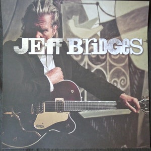 Jeff Bridges - Cartel publicitario/litografía de 18" x 18"
