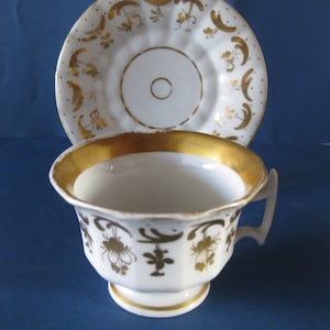 French Style Porcelain Footed Cup and Saucer XIX Th Century