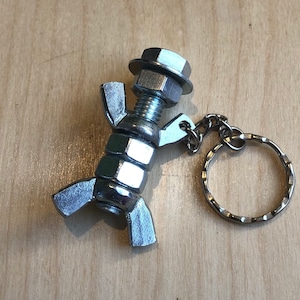 Nut and bolt keychain figure