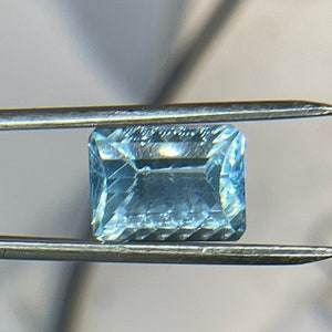 Laser Concave Cut Swiss Blue Topaz 14x10x8 Emerald Cut Loose Gemstone