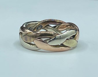 Anillo trenzado de oro sólido tricolor de 14 k (oro amarillo, blanco y rosa). Hecho a mano. Peso: 7,1 g. Talla 5,5.