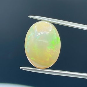8.81 Carat Natural Ethiopian Opal Cabochon Oval Cut Loose Gemstone (17x13x8 MM)