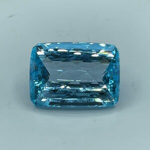 39.49 Carat Super Swiss Blue Topaz Emerald Cut Loose Gemstone (22.75 x 16.62 x 11.51 MM)