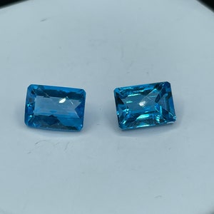 20.04 Carat Super Swiss Blue Topaz Emerald Cut Loose Gemstones 14.14 x 10.00 x 7.27 MM