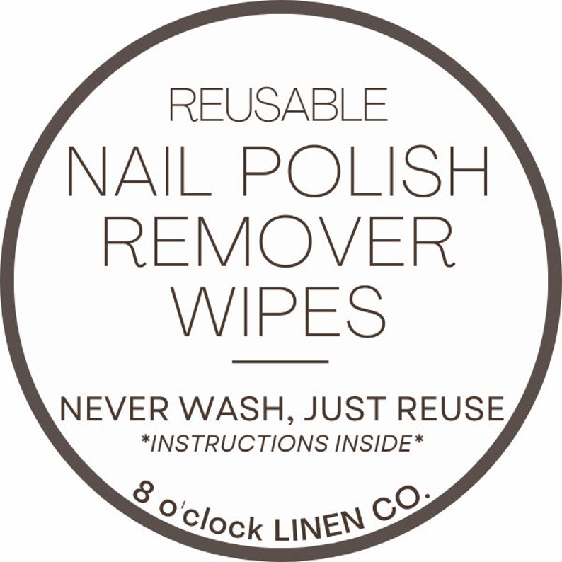 May include: Circular label with the text "REUSABLE NAIL POLISH REMOVER WIPES" in a dark brown font. The text "NEVER WASH, JUST REUSE" is below the main text, with "*INSTRUCTIONS INSIDE*" underneath. The brand name "8 o'clock LINEN CO." is at the bottom.