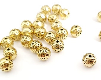 Perles charmes ,or antique , 6 ou 8 mm , lot de 40 grammes