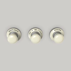 Three set escutcheon dash rings, 34mm outer diameter, 19mm inner diameter.