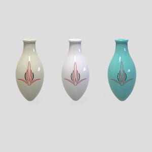May include: Three teardrop-shaped vases in cream, white, and turquoise. Each vase features a narrow neck and a pointed base, decorated with a symmetrical pinstripe design in red and black lines centered on the front of the smooth, glossy surface.