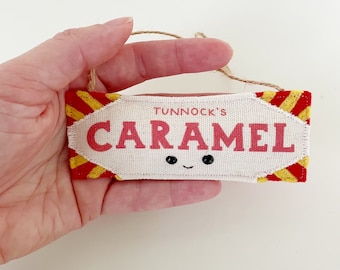 Handmade Tunnocks Caramel felt hanging decoration.