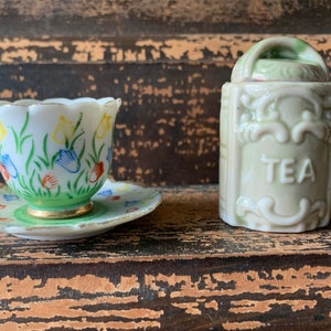 tiny vintage tea canister or small tea cup and saucer Made in Japan (M)