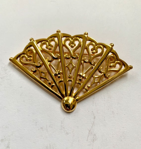 vintage gold fan Gem