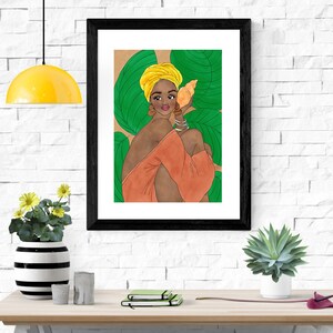 May include: A framed illustration of a woman with brown skin wearing a yellow turban and a peach-colored dress. She is holding a seashell to her ear and is surrounded by green leaves.