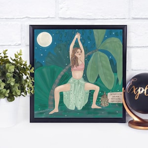 May include: A framed illustration of a woman in a yoga pose in a forest setting. The woman is wearing a pink top and a green skirt. The background is a dark blue with green leaves and a full moon. The text "The light in me sees and honors the light in you" is in the bottom right corner.