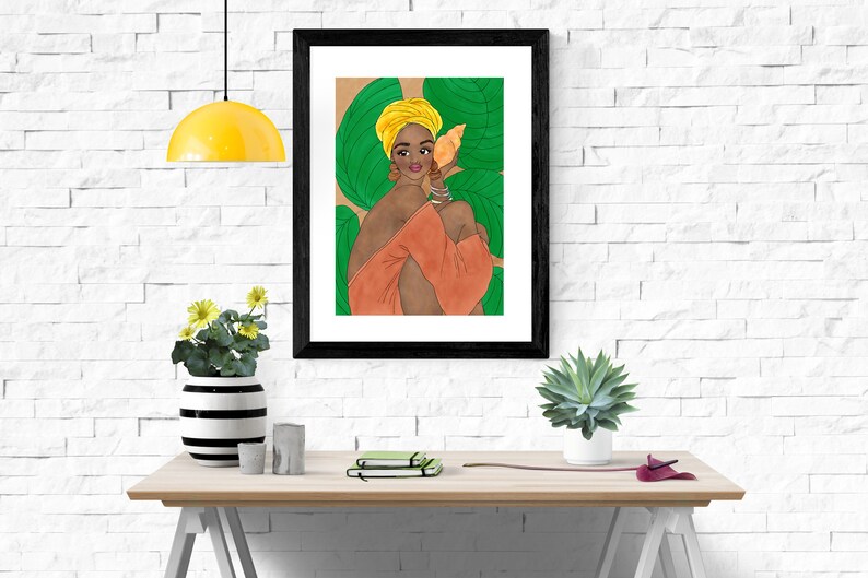 May include: A framed illustration of a woman with dark skin wearing a yellow turban and a peach-colored dress. She is holding a seashell to her ear and is surrounded by green leaves.