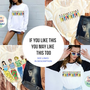 May include: Four different t-shirts with a graphic design of women walking in a line. The shirts are white, cream, black and white, and white with a black sleeve. The text "More Colours Available!" is on two of the shirts. The text "If you like this you may like this too" is on a white circle. The text "See links in description" is below the circle.