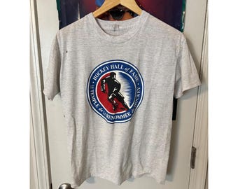 Camiseta vintage para hombre del Salón de la Fama del Hockey, color gris jaspeado.