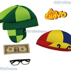 May include: Two felt hats, one green and white checkered, the other red, yellow, and blue with a yellow brim. The hats are on a white background. The text "El Chavo" is in orange letters on a yellow background.