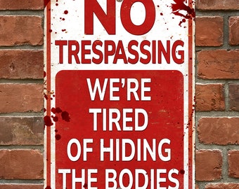 Funny no trespassing sign, we're tired of hiding the bodies; second amendment rights warning sign; outdoor metal sign with vintage look