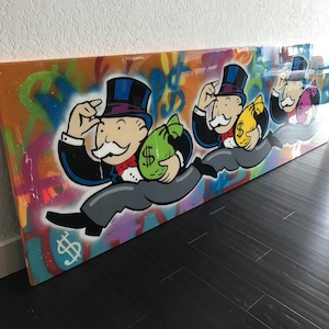 May include: A colorful painting on canvas featuring three Monopoly Man figures running with bags of money. The background is a vibrant mix of graffiti-style colors and dollar signs.