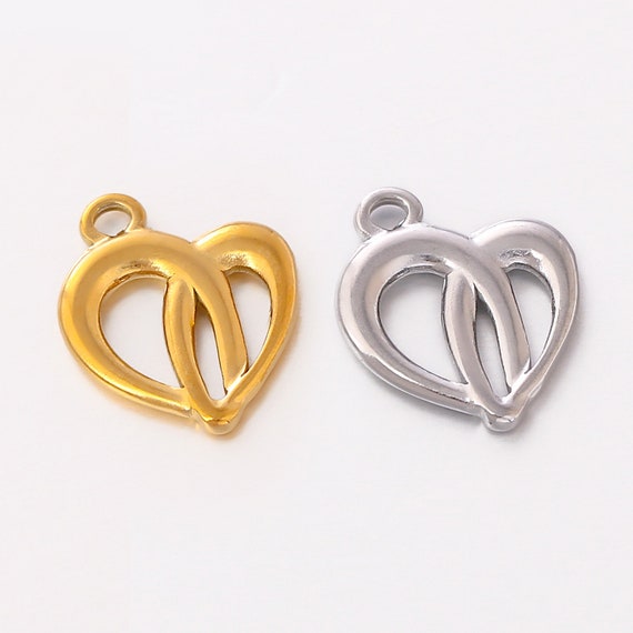 Collana in oro bianco 18k e ciondolo a cuore con pavè brunito in zaffiri rosa e diamanti | GV Collana in oro bianco 18k e ciondolo a cuore con pavè brunito in zaffiri rosa e diamanti | GV