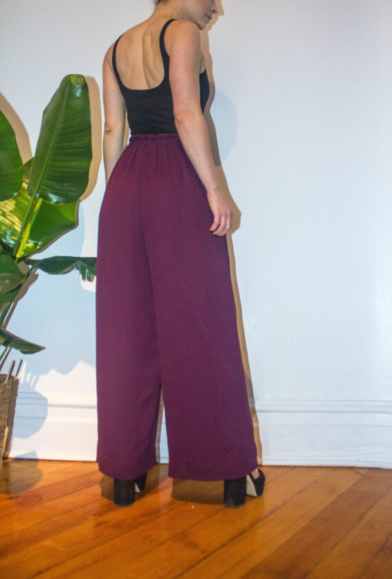purple high waisted trousers