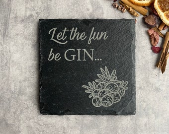 May include: Black slate coaster with the text "Let the fun be GIN..." in white lettering. A juniper berry illustration is in the bottom right corner.