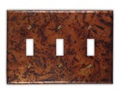 Triple Toggle Copper Switch Plate in Distressed Medium