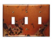 Triple Toggle Copper Switch Plate in Bamboo