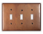 Triple Toggle Copper Switch Plate in Antique