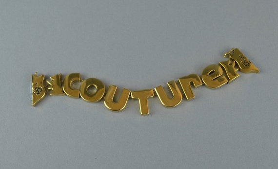 Juicy Couture Goldtone Couture Letter Bracelet